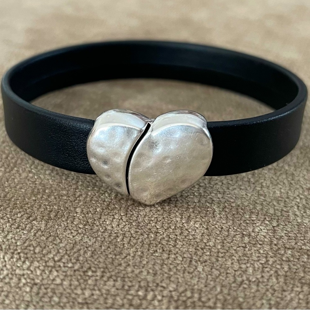 Premium black leather bracelet with dimpled magnetic heart clasp. Size 7”